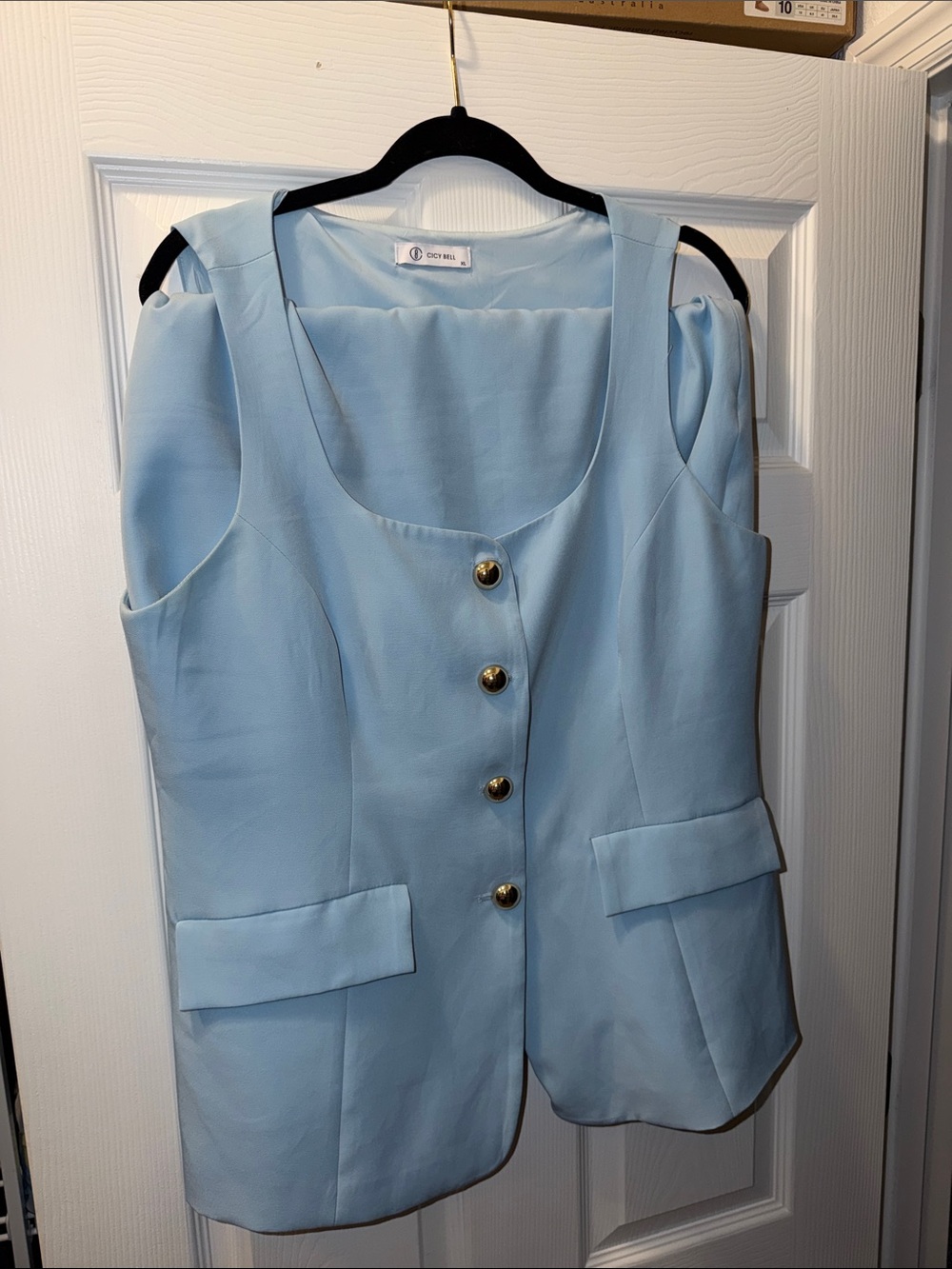 Light Blue Sleeveless Button Vest with Gold Buttons